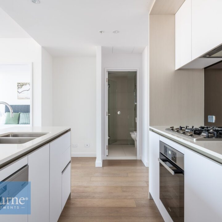 kitchen with stove, cooktop, dishwasher, sink